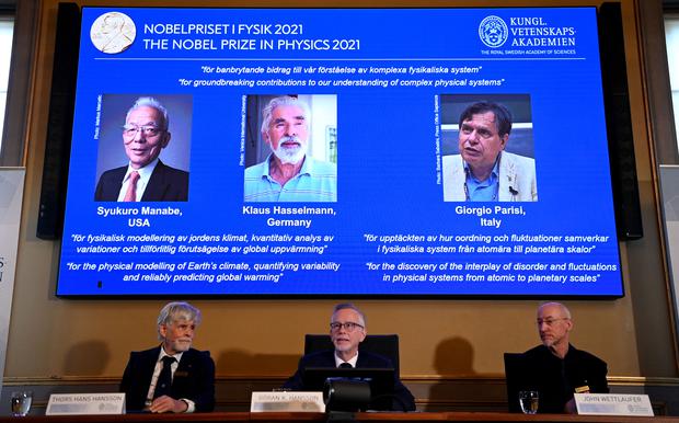 Siokoro Manabe (1st), Klaus Haselmann and Giorgio Baresi share the award.  (Photo: Jonathan Naxstrand/AFP)